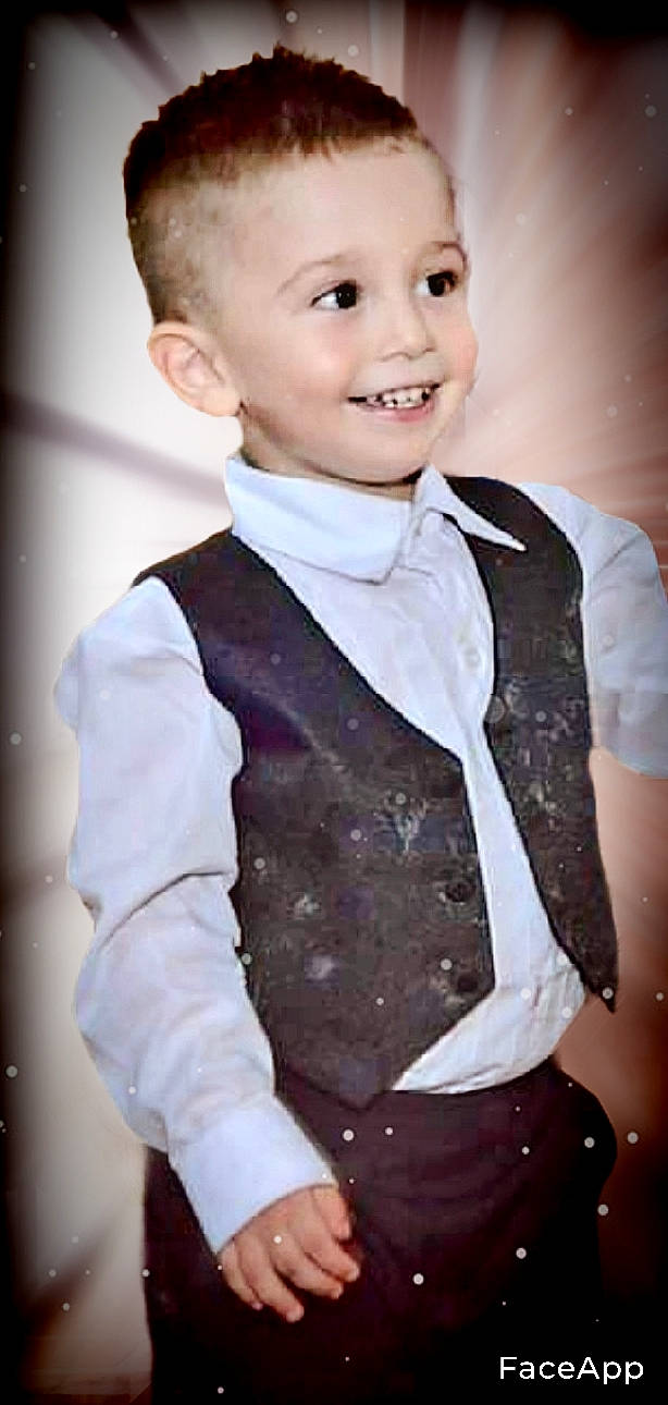 Mikael is registered to the contest to win money with this photo: arm, baby_toddler_clothing, blazer, bow_tie, collar, dress_shirt, event, flash_photography, formal_wear, happy, joy, outerwear, person, school_uniform, sleeve, smile, standing, suit, tie, toddler