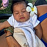 Remedyrose Garcia is registered to the contest to win money with this photo: baby, sleeping, flower, blanket, arm, outdoor, grass, person, hand, skin, white_clothing, bracelet, flower_in_hair, infant, peaceful, closeup, nature, casual_clothing, relaxation, portrait