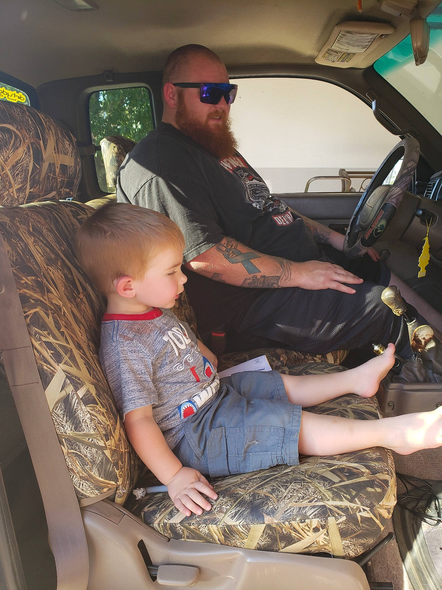 Hunter joined the competition — help win amazing prizes! auto_part, automotive_exterior, car, car_seat, car_seat_cover, family_car, luxury_vehicle, person, sitting, vehicle