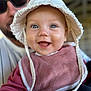 Charlie participe au concours pour gagner de l'argent avec cette photo : baby, smiling, face, hat, bib, child, person, closeup, happy, blue_eyes, adult, sunglasses, background_blur, casual_clothing, portrait, indoor, cute, infant, headwear, joyful