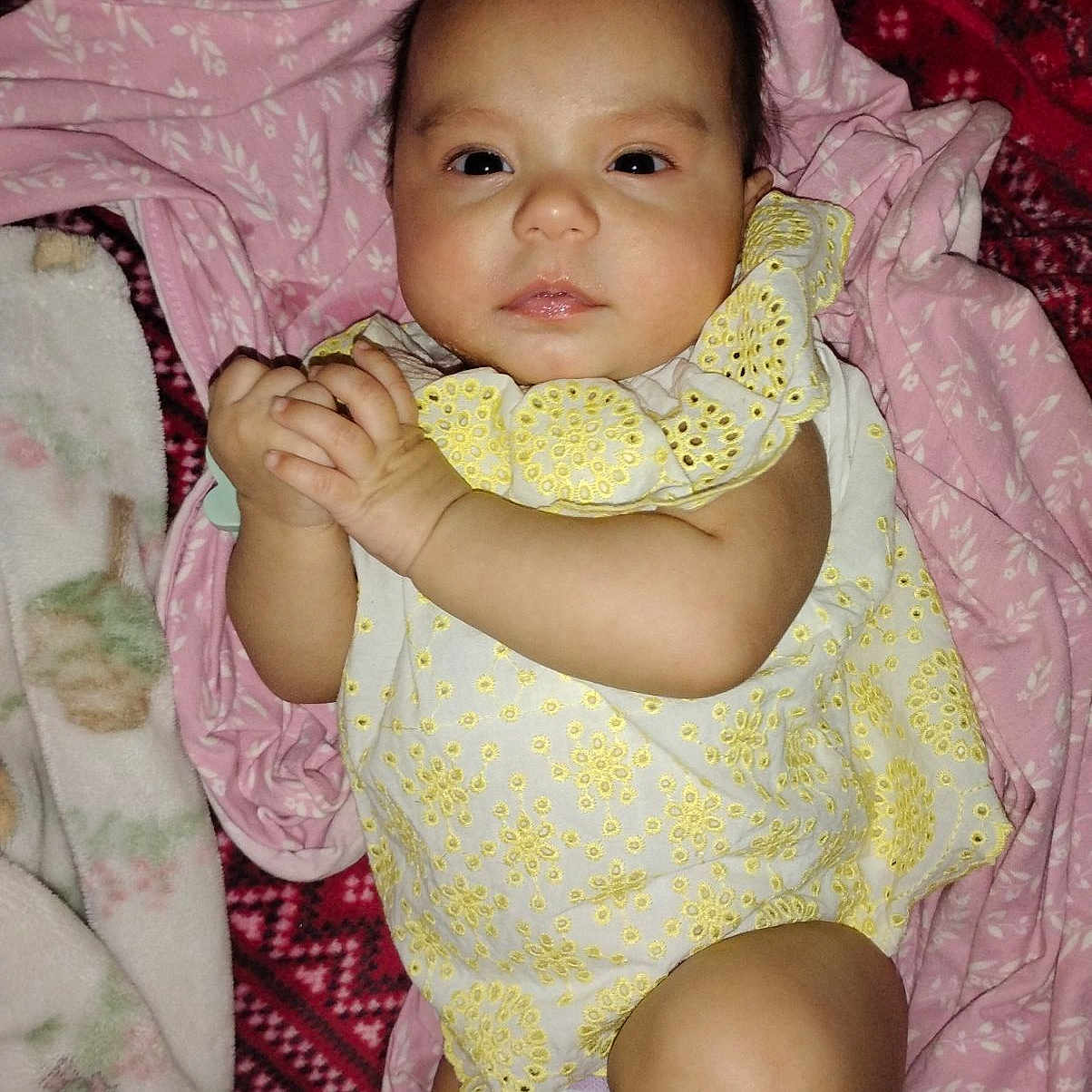 Klarke joined the competition — help win amazing prizes! baby, bed, blanket, clothing, couch, cushion, dress, face, furniture, happy, hat, head, homedecor, newborn, person, photography, portrait, quilt, sitting, smile