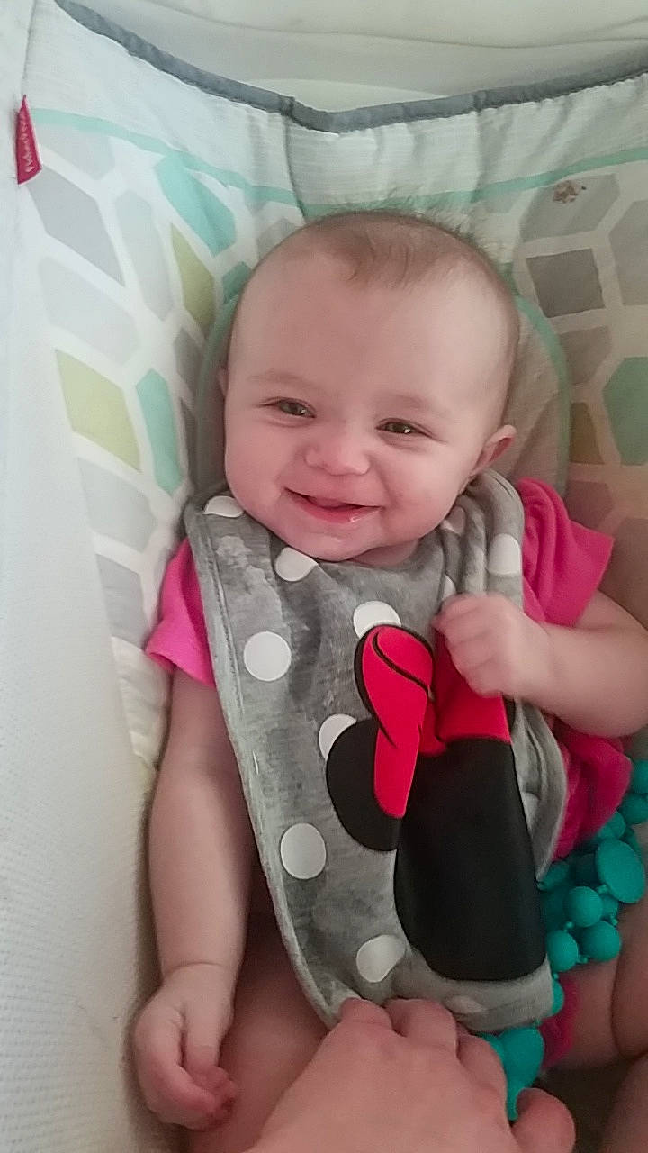 Rosaleigh is registered to the contest to win money with this photo: baby, baby_products, baby_toddler_clothing, cheek, child, finger, hand, head, joy, mouth, neck, person, pink, play, product, skin, thumb, toddler