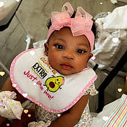 Ahmillya is registered to the contest to win money with this photo: baby, infant, girl, headband, bow, bib, sitting, mittens, clothing, bottle, floor, blanket, hearts, overlay, indoor, cute, child, person, portrait, love