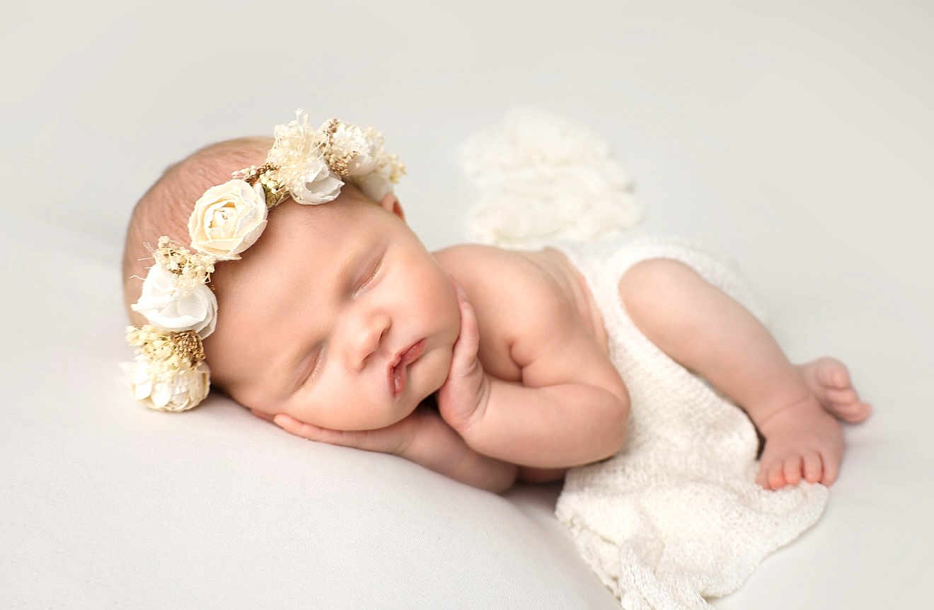 Sienna joined the competition — help win amazing prizes! newborn, baby, sleeping, flower_crown, white_blanket, infant, peaceful, soft_texture, closeup, portrait, cute, tiny_hands, tiny_feet, skin, headband, resting, cozy, innocence, studio, white_background