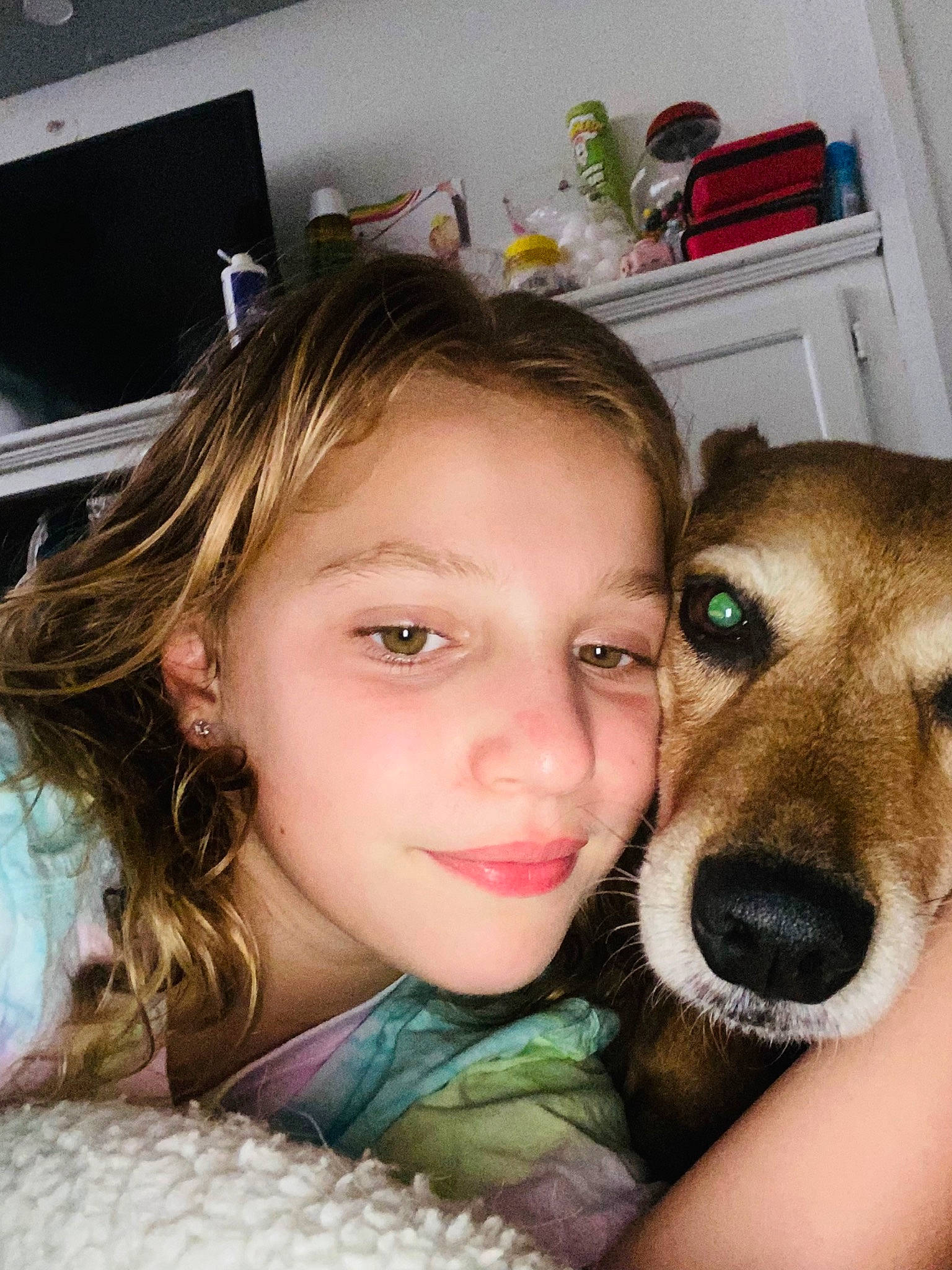 Sue is registered to the contest to win money with this photo: blond, carnivore, child, companion_dog, dog, dog_breed, ear, eyebrow, eyelash, fawn, fun, happy, iris, jaw, mouth, nose, selfie, skin, smile, television