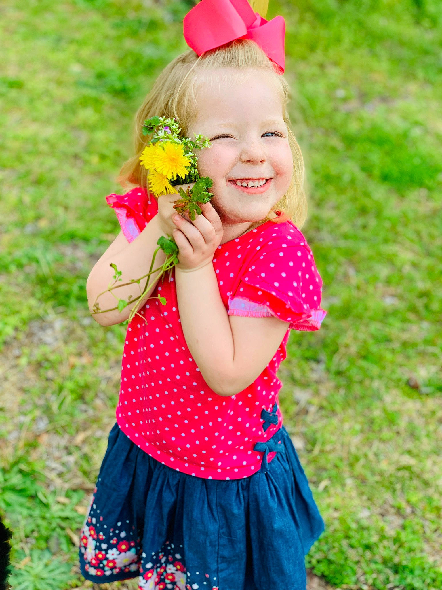 Liliahna is registered to the contest to win money with this photo: baby_toddler_clothing, child, clothing, design, fun, grass, happy, joy, meadow, pattern, people_in_nature, person, pink, play, polka_dot, red, smile, spring, summer, toddler
