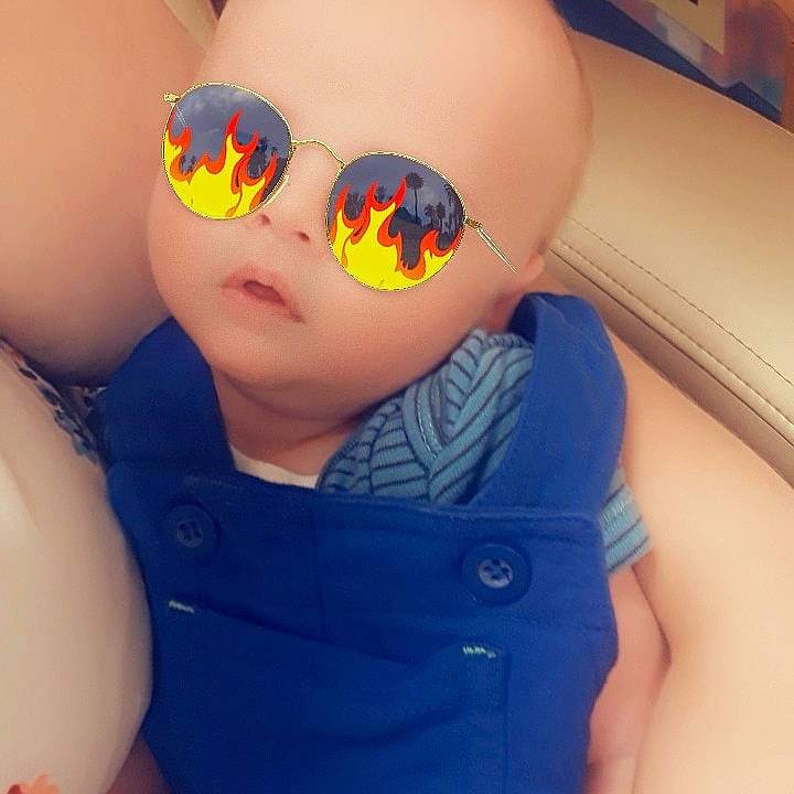 Jayse joined the competition — help win amazing prizes! arm, blue, child, cool, eye, eyewear, face, forehead, glasses, hand, head, lip, mouth, muscle, nose, person, personal_protective_equipment, photography, sunglasses, vision_care