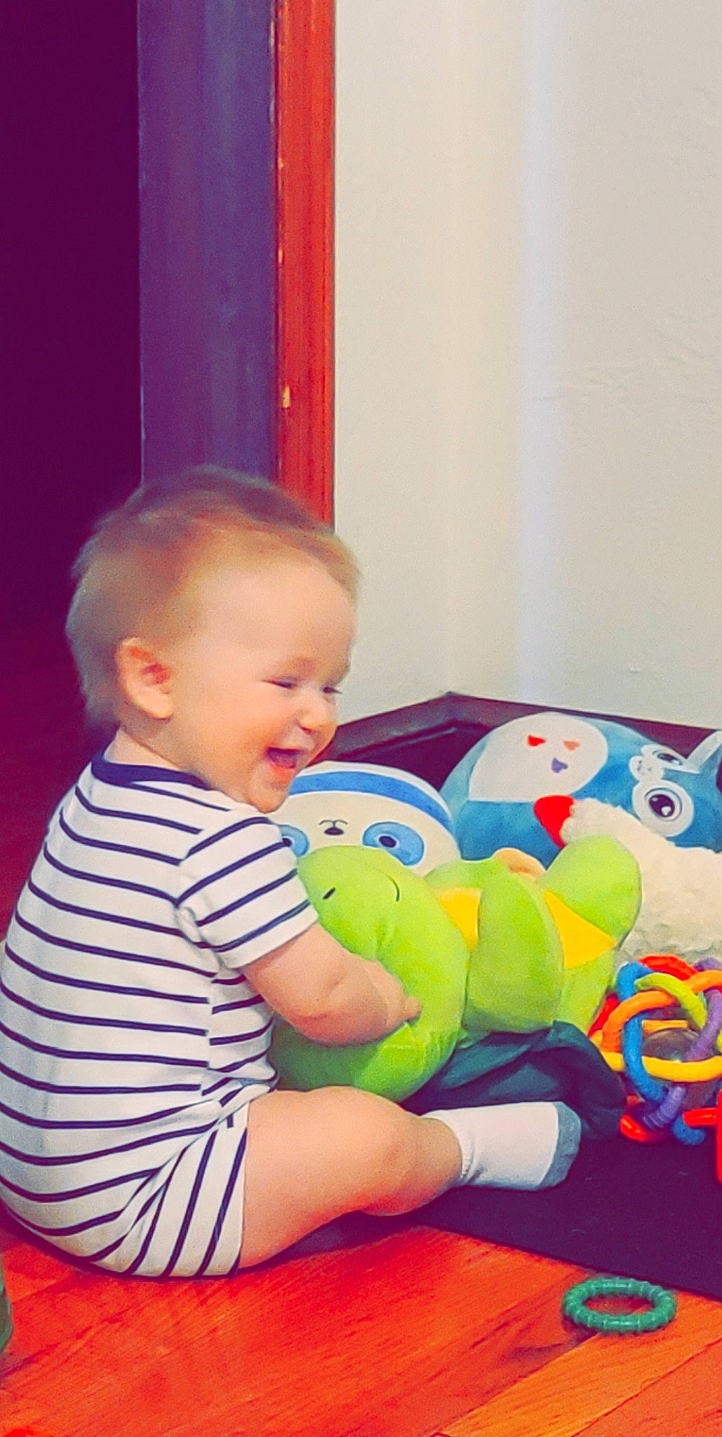 Drake joined the competition — help win amazing prizes! arm, baby, baby_playing_with_toys, baby_toddler_clothing, cheek, child, comfort, flooring, fun, happy, human_body, person, play, room, sitting, skin, sock, stuffed_toy, t_shirt, toddler