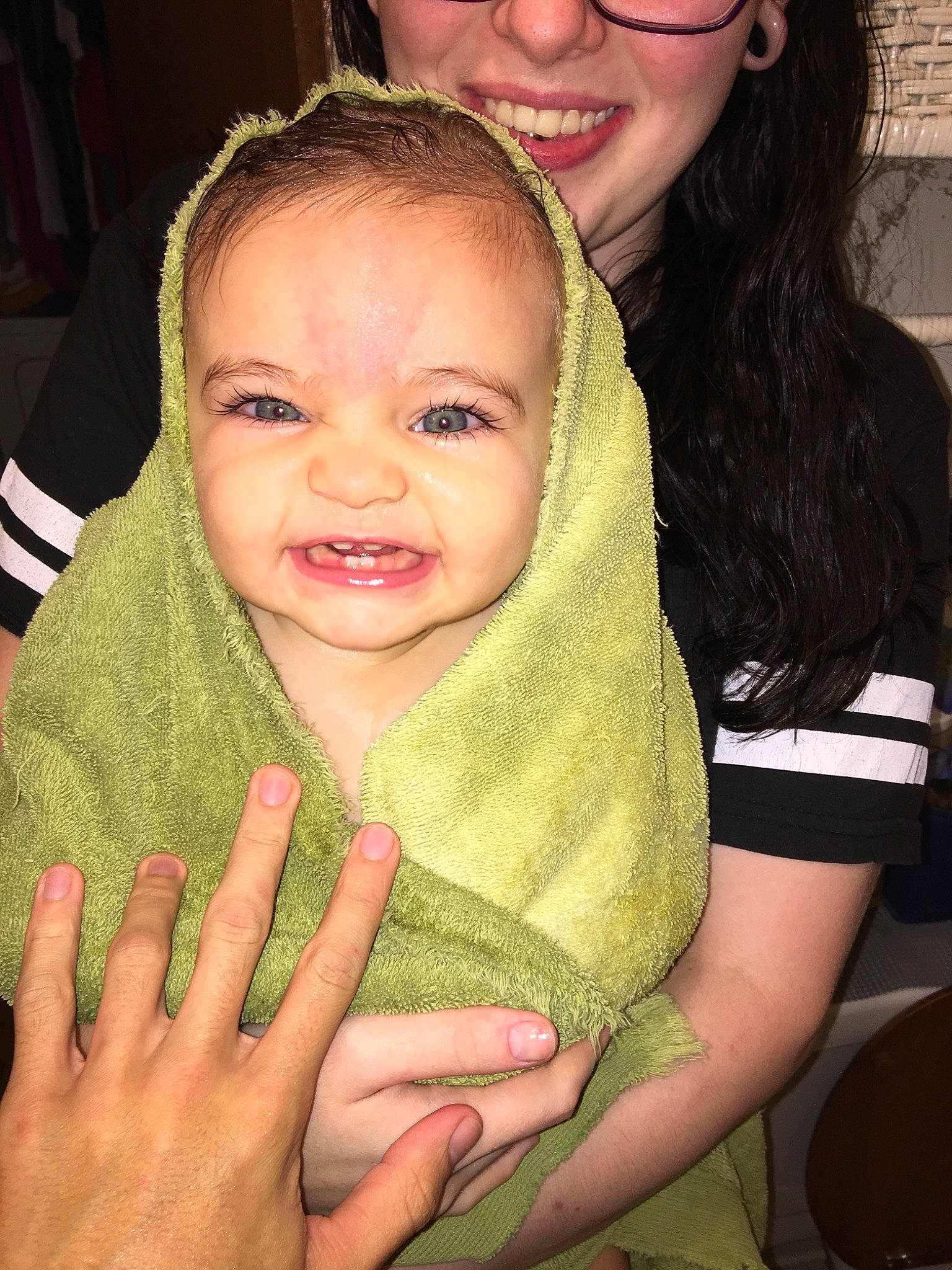 Unity is registered to the contest to win money with this photo: child, daughter, face, finger, fun, gesture, hand, happy, head, hug, mother, neck, person, skin, smile, thumb, toddler