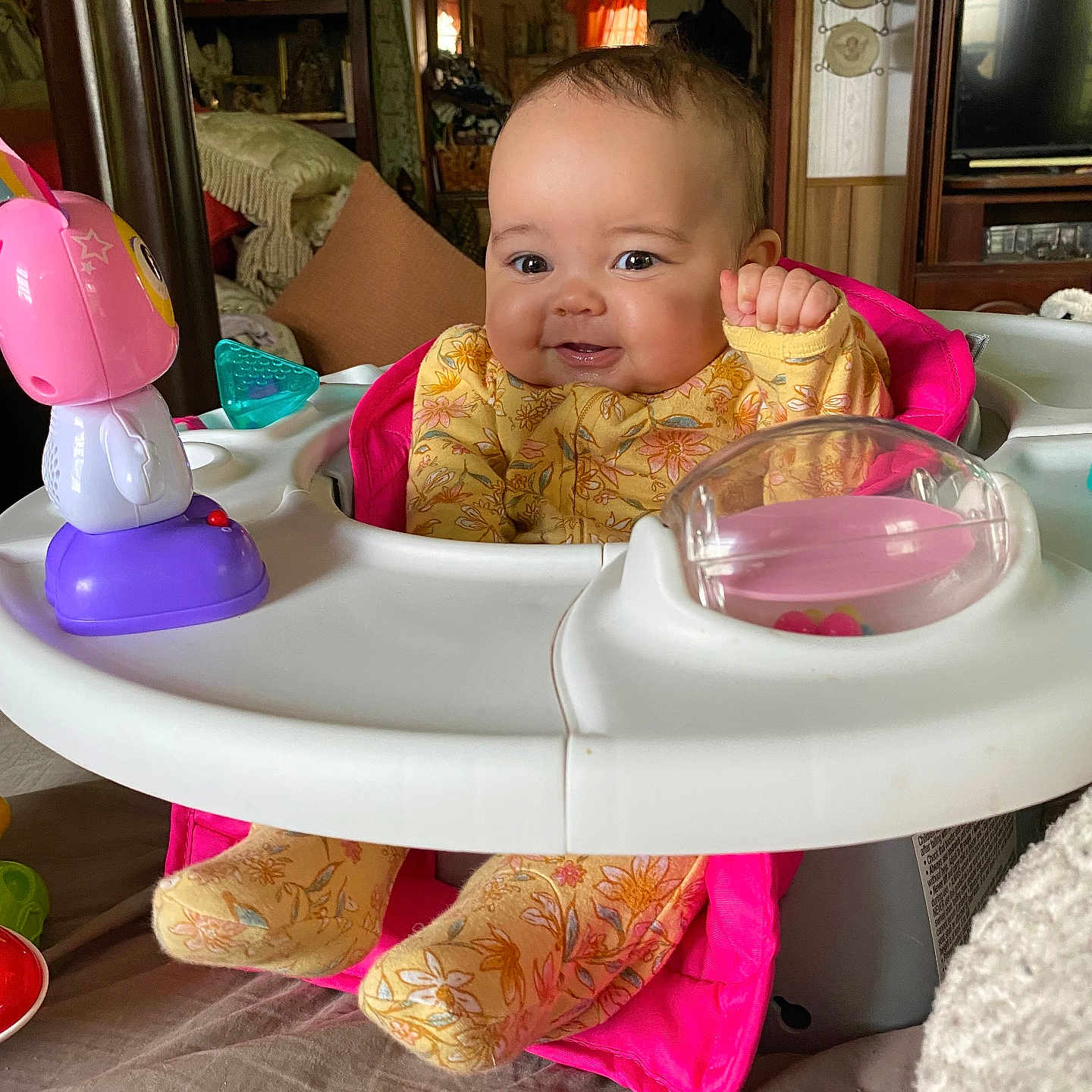 Jayla is registered to the contest to win money with this photo: baby, computerhardware, couch, crib, cutlery, diningtable, electronics, face, furniture, hardware, head, monitor, person, photography, portrait, purple, screen, spoon, table, tv