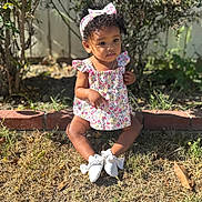 Autumn joined the competition — help win amazing prizes! toddler, child, outdoor, grass, flower_dress, headband, shoes, white_bows, sunlight, garden, plants, brick_edge, cute, portrait, sitting, baby, summer, nature, young_child, expression