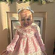 Flossie joined the competition — help win amazing prizes! child, toddler, girl, dress, pink, white, flowers, fireplace, indoor, portrait, smiling, ribbons, bows, long_sleeves, decor, shadow, sunlight, cute, happy, person
