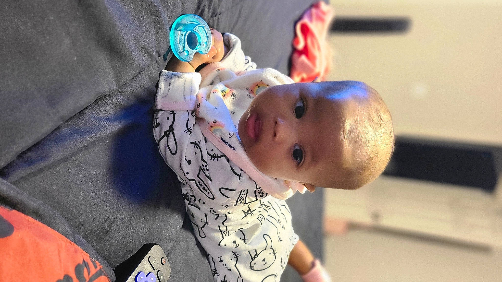 Nia joined the competition — help win amazing prizes! baby, baby_products, baby_toddler_clothing, blue, child, electric_blue, fashion_accessory, fun, happy, hat, leisure, linens, pattern, person, play, room, sitting, t_shirt, toddler