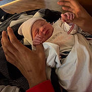 Halo joined the competition — help win amazing prizes! architecture, baby, blanket, bodypart, building, couch, face, finger, furniture, hand, hardwood, head, hospital, newborn, patient, person, photography, portrait, wood, wrist