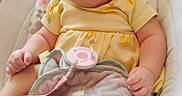 Trinity is registered to the contest to win money with this photo: baby, baby_blanket, bouncer, chubby_cheeks, closeup, clothing, curly_hair, feet, hand, happy, headband, infant, nursery, pacifier_clip, portrait, seat_cushion, skin, smiling, soft_lovey, yellow_dress