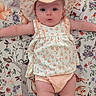Rikku joined the competition — help win amazing prizes! baby, child, infant, hat, clothing, pattern, blanket, animal_print, deer, squirrel, rabbit, bird, floral, nature, cute, smiling, portrait, lying_down, indoors, colorful