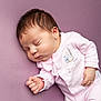 Jovi-May is registered to the contest to win money with this photo: baby, newborn, sleeping, infant, pink_clothing, soft_surface, peaceful, portrait, child, cute, resting, young_child, indoors, closeup, small_hand, face, head, skin, hair, cozy