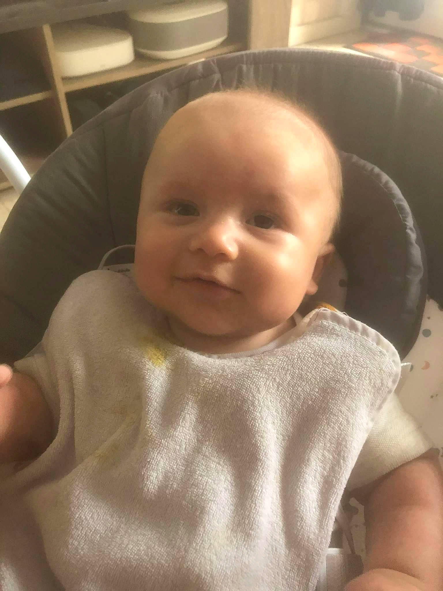 Enzo participe au concours pour gagner de l'argent avec cette photo : baby, baby_toddler_clothing, cheek, child, chin, collar, comfort, eyebrow, fun, iris, joy, linens, lip, mouth, person, sitting, skin, sleeve, smile, t_shirt