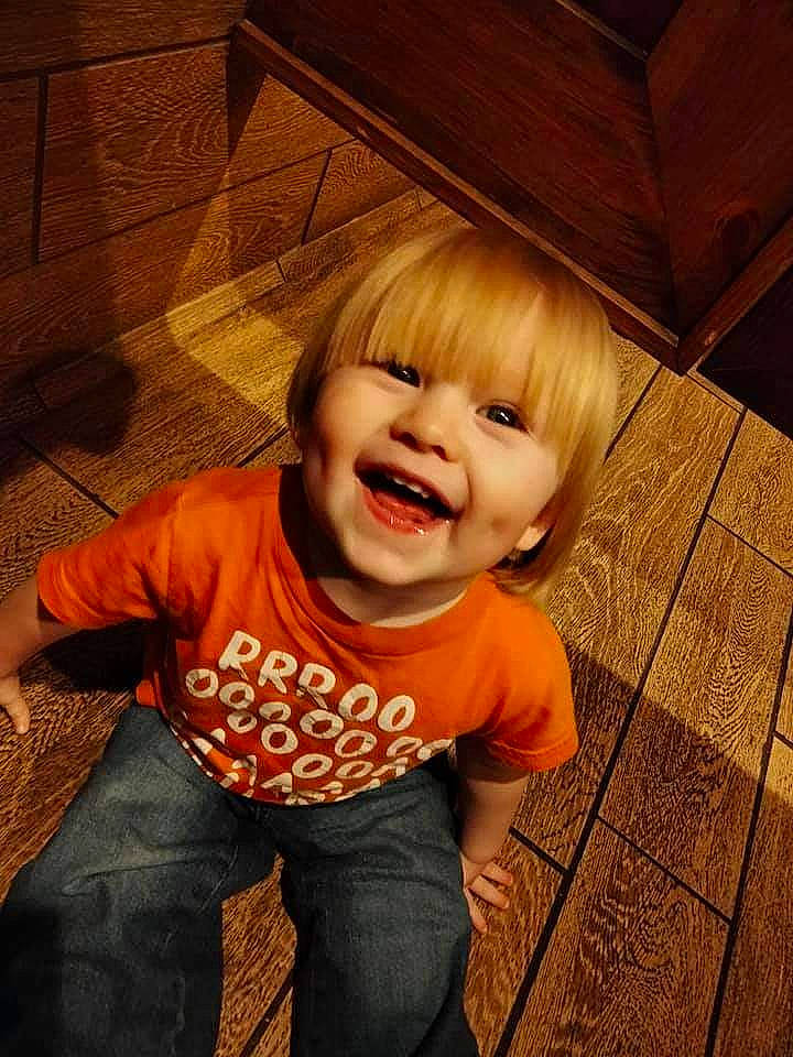 Conner joined the competition — help win amazing prizes! baby_toddler_clothing, cheek, child, chin, floor, flooring, fun, happy, hardwood, jeans, mouth, nose, person, skin, sleeve, smile, t_shirt, tints_and_shades, toddler, wood