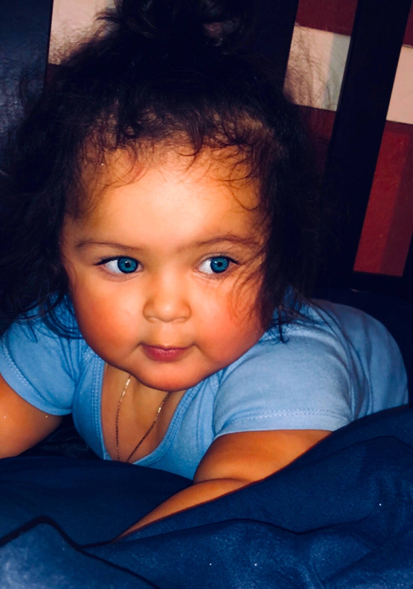 Yasmín joined the competition — help win amazing prizes! beauty, blue, cheek, child, chin, emotion, eye, eyebrow, face, forehead, girl, hair, hairstyle, head, human_hair_color, nose, person, sitting, skin, smile