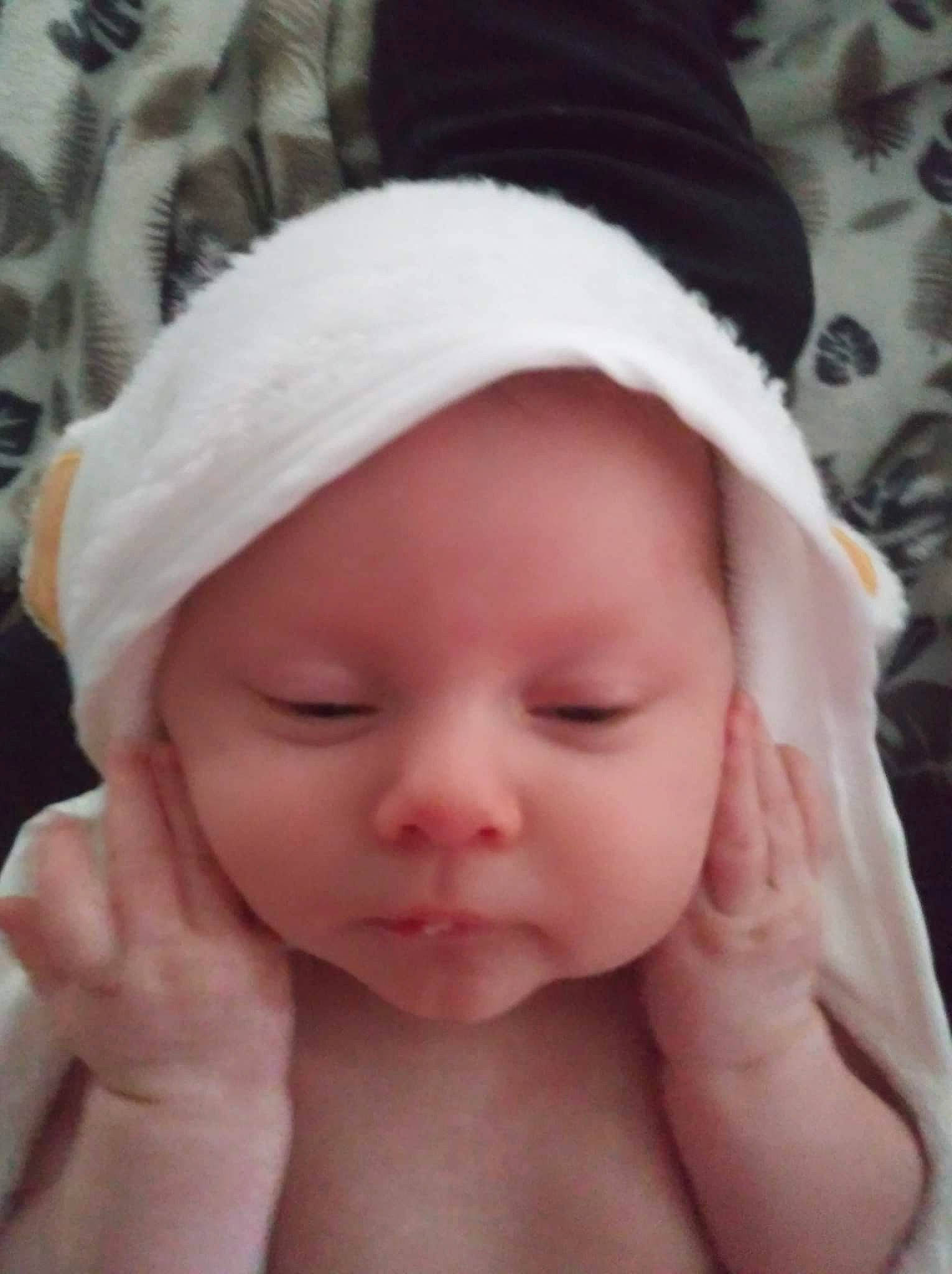 Evalyn is registered to the contest to win money with this photo: arm, baby, baby_sleeping, cheek, comfort, eye, eyebrow, eyelash, finger, gesture, hand, happy, head, headgear, headwear, lip, mouth, nose, person, pink