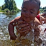 baby, child, closeup, face, family, fun, hand, happy, nature, outdoor, person, playing, river, skin, splash, summer, sunlight, trees, water, water_droplets