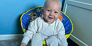 Carson joined the competition — help win amazing prizes! baby, babylaughing, bathroom, chair, clothing, face, furniture, happy, head, homedecor, indoors, jeans, pants, person, photography, portrait, room, sitting, smile, toilet