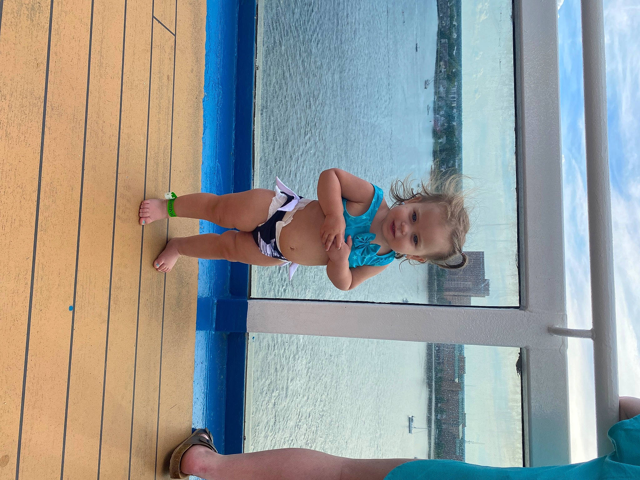 Alayna joined the competition — help win amazing prizes! azure, barefoot, blue, calf, elbow, electric_blue, foot, fun, human_leg, knee, leisure, person, shorts, thigh, toddler, trunk, underpants, waist, water, wood