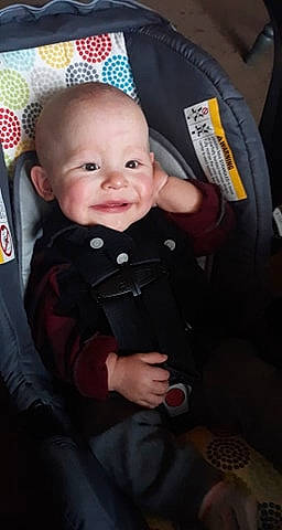 Emerson joined the competition — help win amazing prizes! baby, baby_carriage, baby_in_car_seat, baby_laughing, baby_products, car_seat, cheek, child, person, product, seat_belt, sitting, smile, toddler
