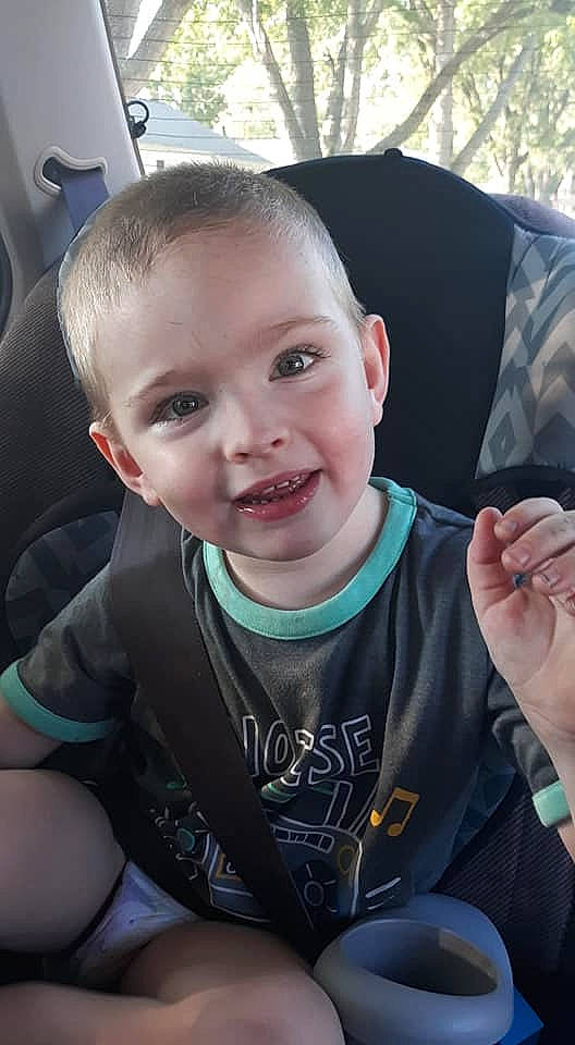Xavier joined the competition — help win amazing prizes! baby, car_seat, child, cool, ear, face, facial_expression, person, skin, smile, toddler, vacation