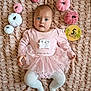 5_months, autumn_theme, baby, baby_girl, blue_eyes, child, cozy, cute, indoors, infant, looking_at_camera, lying_down, patterned_blanket, pink_clothing, plush_pumpkins, portrait, soft_toys, tutu, white_tights, wooden_milestone