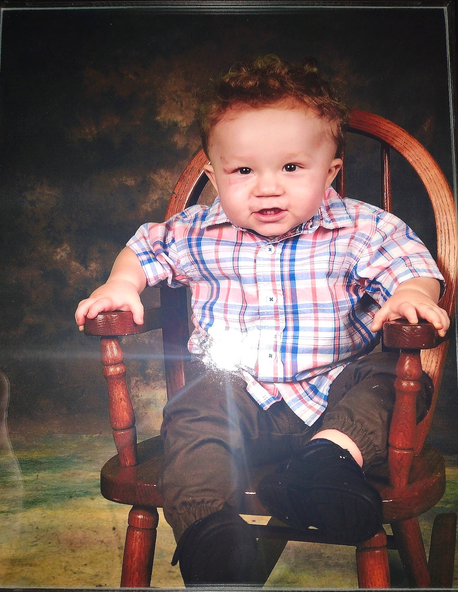 Remington is registered to the contest to win money with this photo: baby_toddler_clothing, chair, cheek, child, cool, electric_blue, facial_expression, flash_photography, fun, happy, iris, leg, person, plaid, skin, sleeve, standing, tartan, tints_and_shades, toddler
