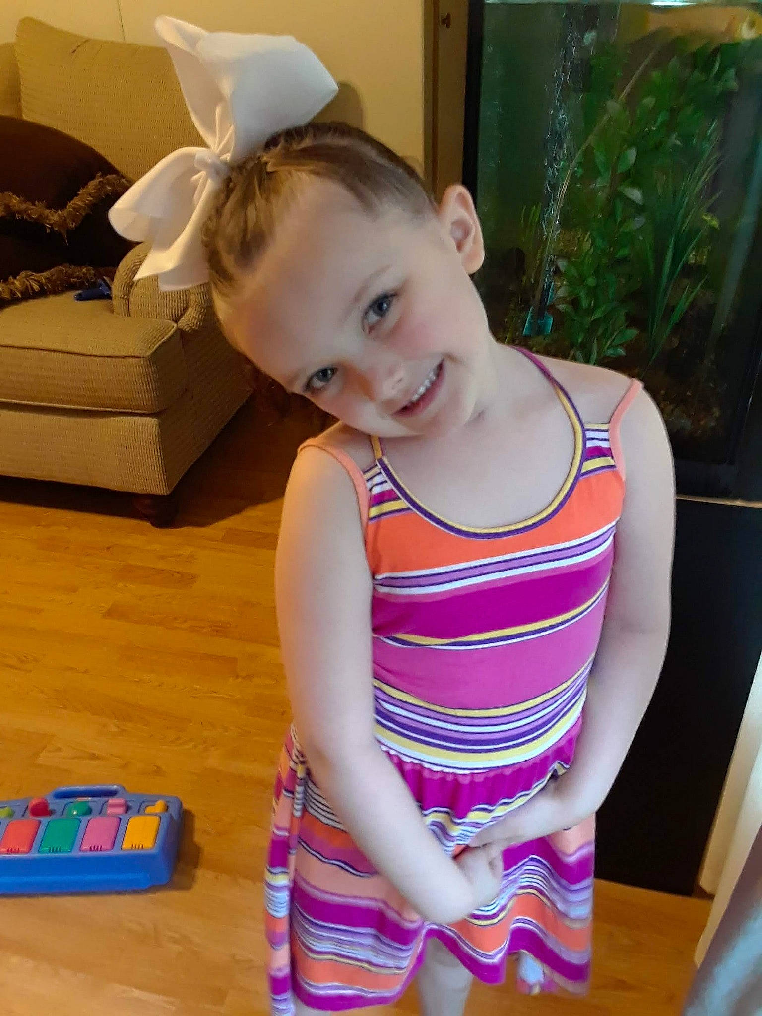 Aria is registered to the contest to win money with this photo: child, joy, person, toddler