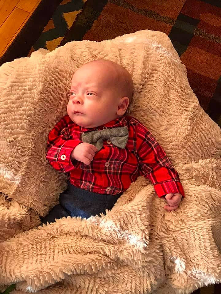 Deklan is registered to the contest to win money with this photo: baby, cheek, child, design, pattern, person, plaid, tartan, textile, toddler, wool