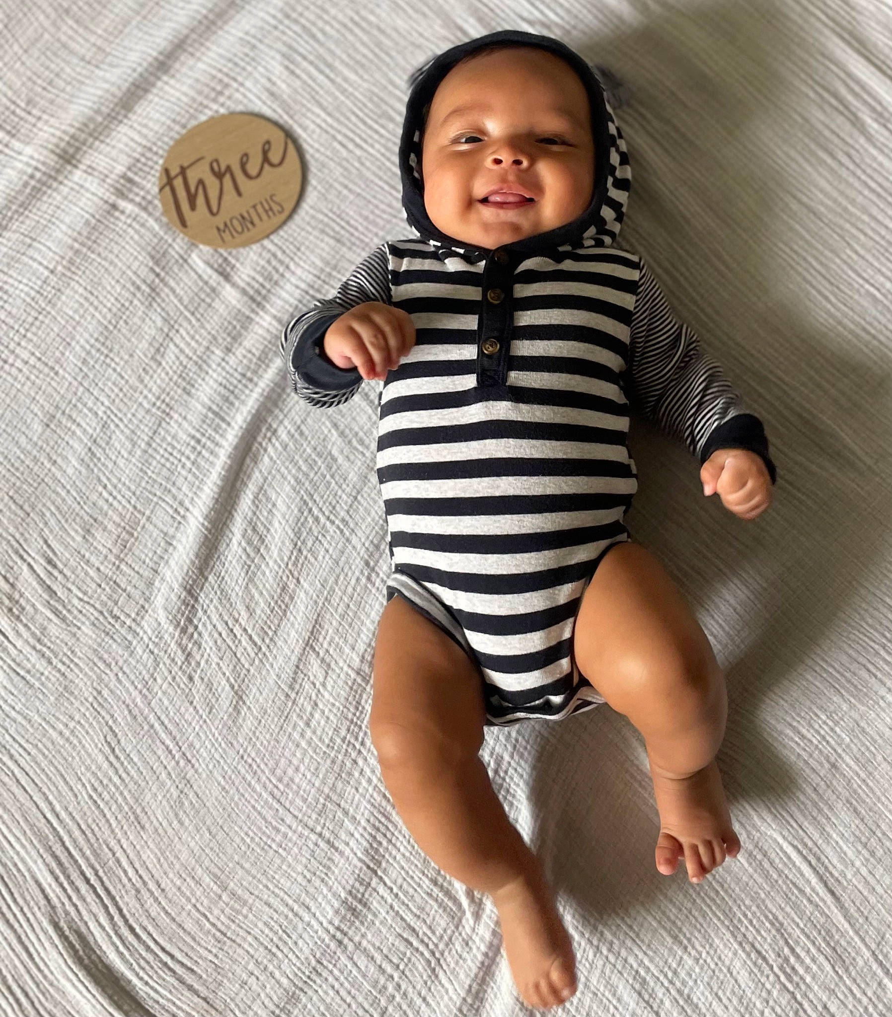 Ivan joined the competition — help win amazing prizes! baby, baby_toddler_clothing, child, comfort, face, finger, foot, gesture, head, human_leg, infant_bodysuit, joint, knee, linens, one_piece_garment, pattern, person, sleeve, thigh, thumb