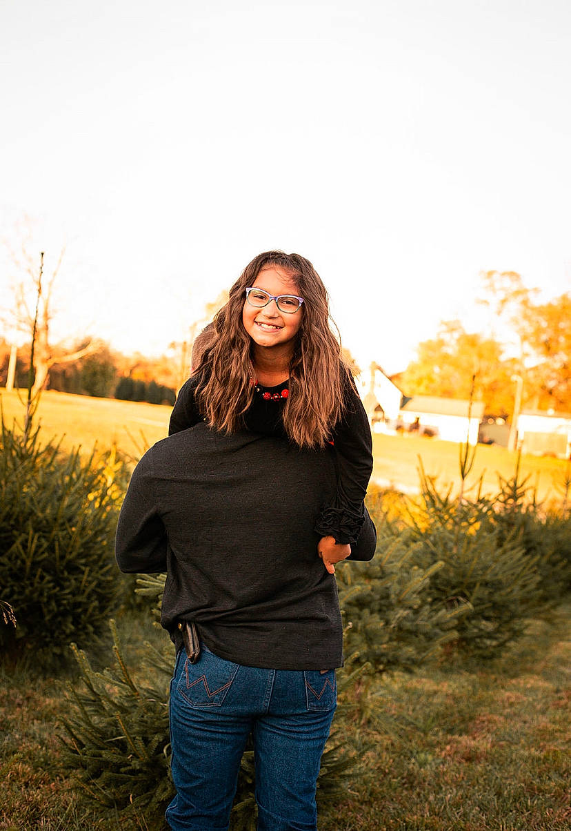 Kaylee joined the competition — help win amazing prizes! clothing, eyewear, flash_photography, grass, grassland, hair, hairstyle, happy, jeans, joy, landscape, outerwear, people_in_nature, person, plant, sky, standing, street_fashion, sunlight, tree