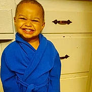 Za'Mir joined the competition — help win amazing prizes! child, toddler, smiling, blue_bathrobe, indoor, dresser, furniture, happy, person, cute, portrait, young_child, clothing, cabinet, home, joyful, small_child, baby, face, standing
