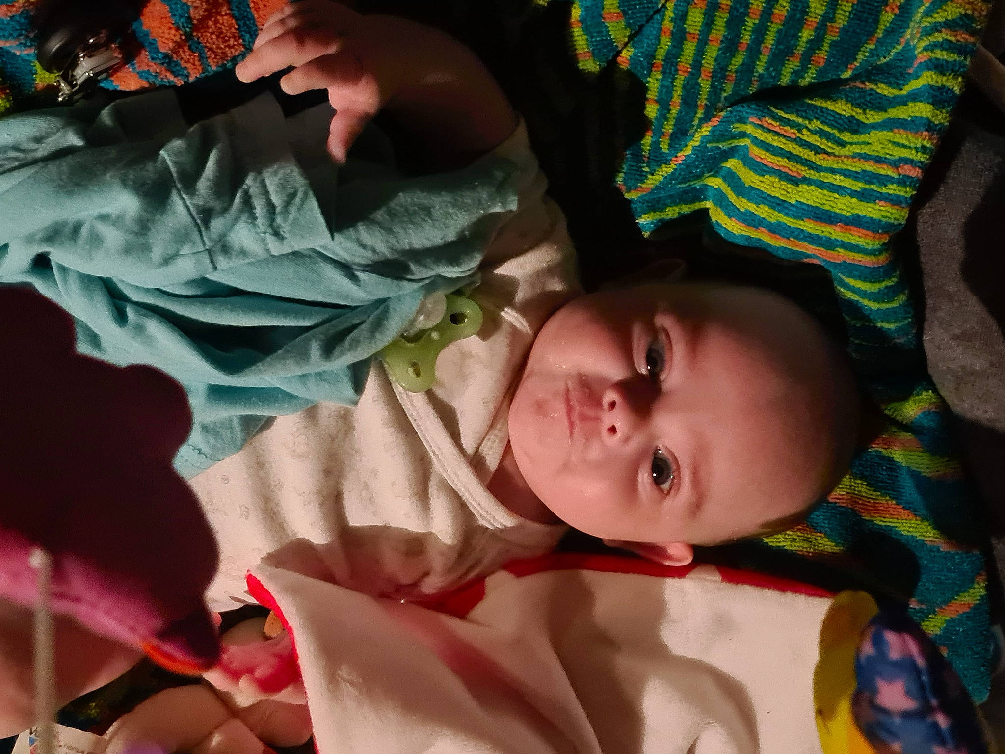 Mathis participe au concours pour gagner de l'argent avec cette photo : baby, baby_products, baby_toddler_clothing, cheek, child, comfort, eye, eyebrow, face, iris, linens, lip, mouth, nose, pattern, person, room, skin, textile, toddler