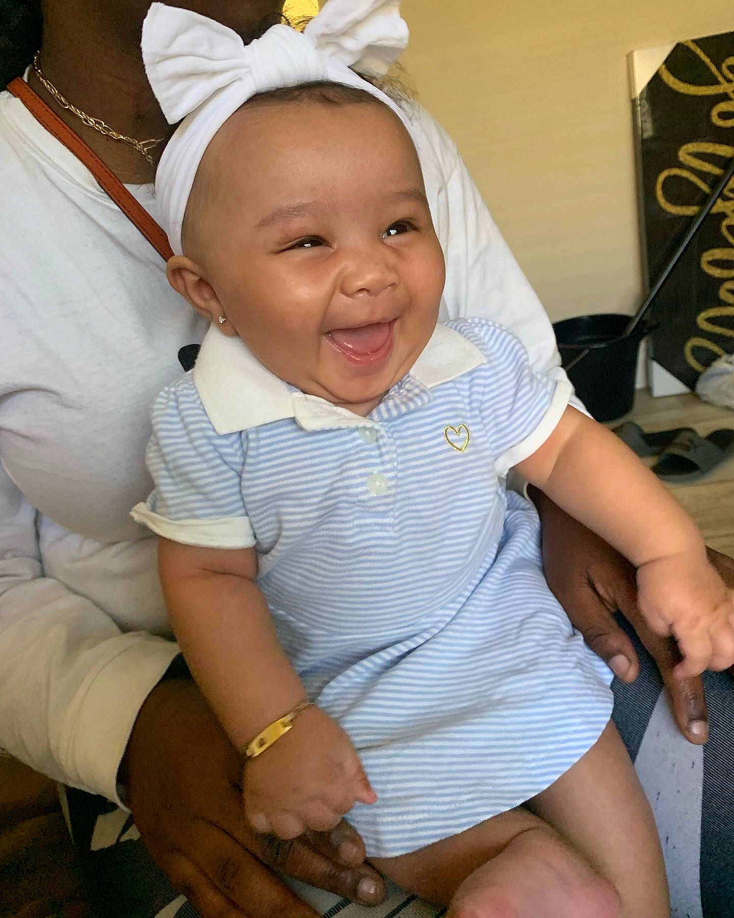 Kennadi joined the competition — help win amazing prizes! baby_toddler_clothing, dress, eye, face, facial_expression, finger, fun, gesture, hairstyle, hand, happy, head, human_body, leg, person, pink, skin, smile, thumb, toddler