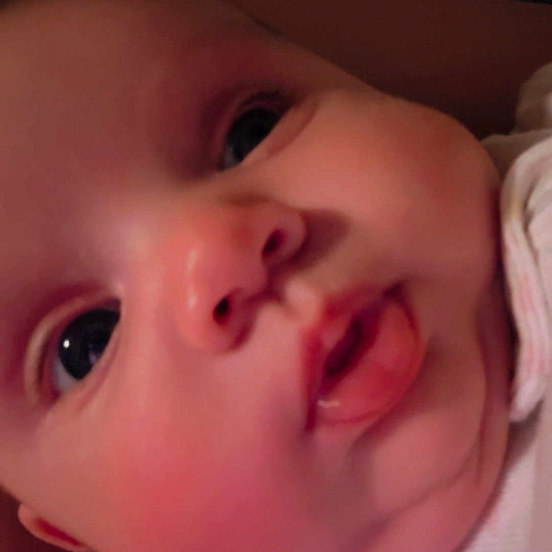 Emilia joined the competition — help win amazing prizes! baby, closeup, face, child, infant, curious, skin, eyes, mouth, cheeks, clothing, soft, indoors, portrait, person, head, cute, expression, newborn, babywear