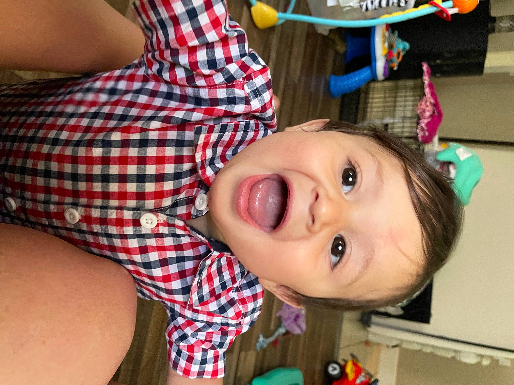 Jabari is registered to the contest to win money with this photo: baby, cheek, child, ear, eyelash, fun, happy, leisure, mouth, nose, pattern, people, person, plaid, skin, smile, summer, tartan, textile, toddler