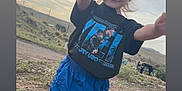 Mila joined the competition — help win amazing prizes! child, outdoor, smiling, tshirt, blue_shorts, dirt_path, sky, cloudy, grass, rocks, playing, happy, standing, young, person, nature, casual_clothing, daylight, emotion, gesture