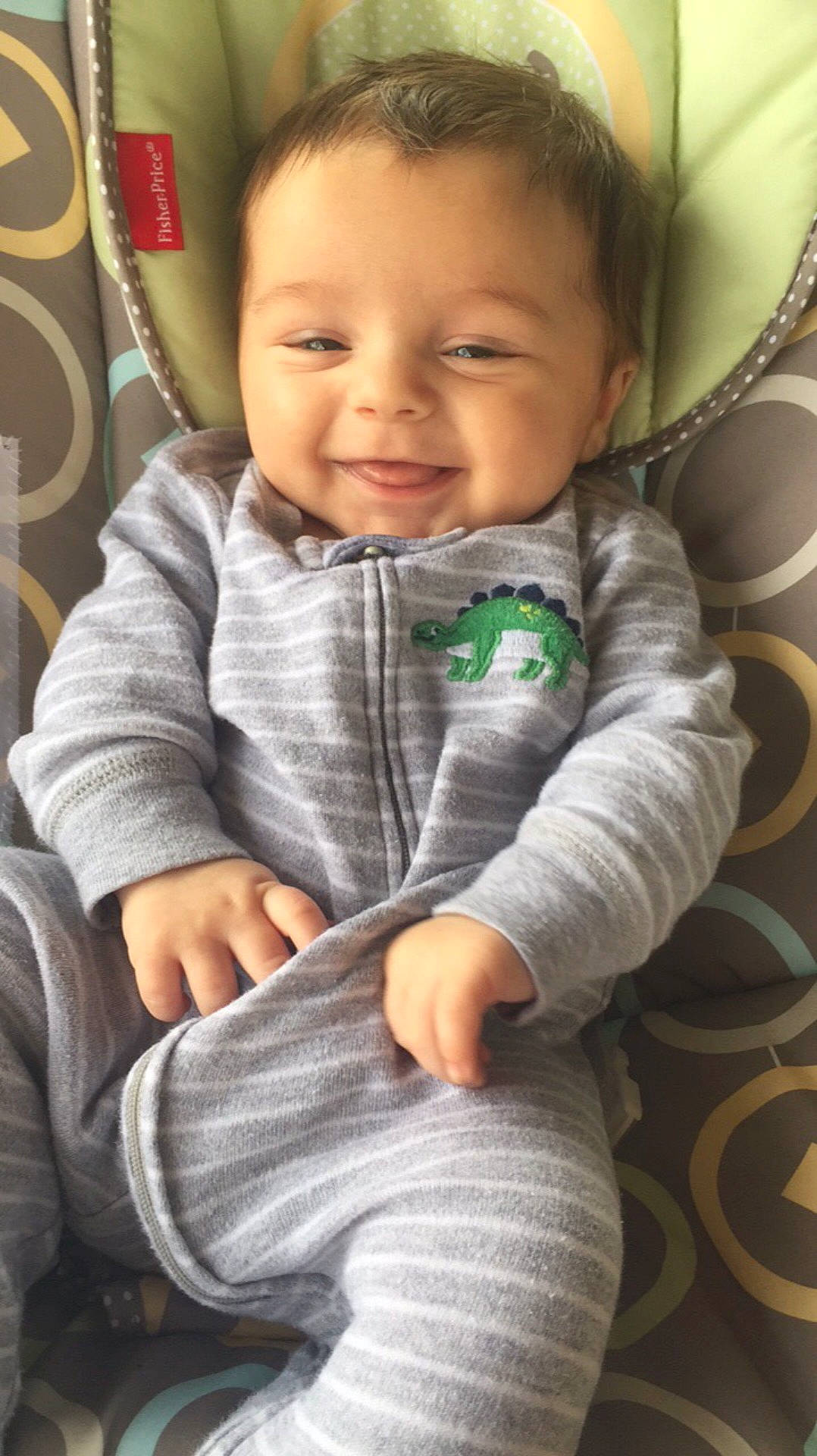 Liam is registered to the contest to win money with this photo: arm, boy, cheek, child, day, eye, fun, infant, iris, knitting, nose, person, play, product, sitting, skin, smile, textile, toddler