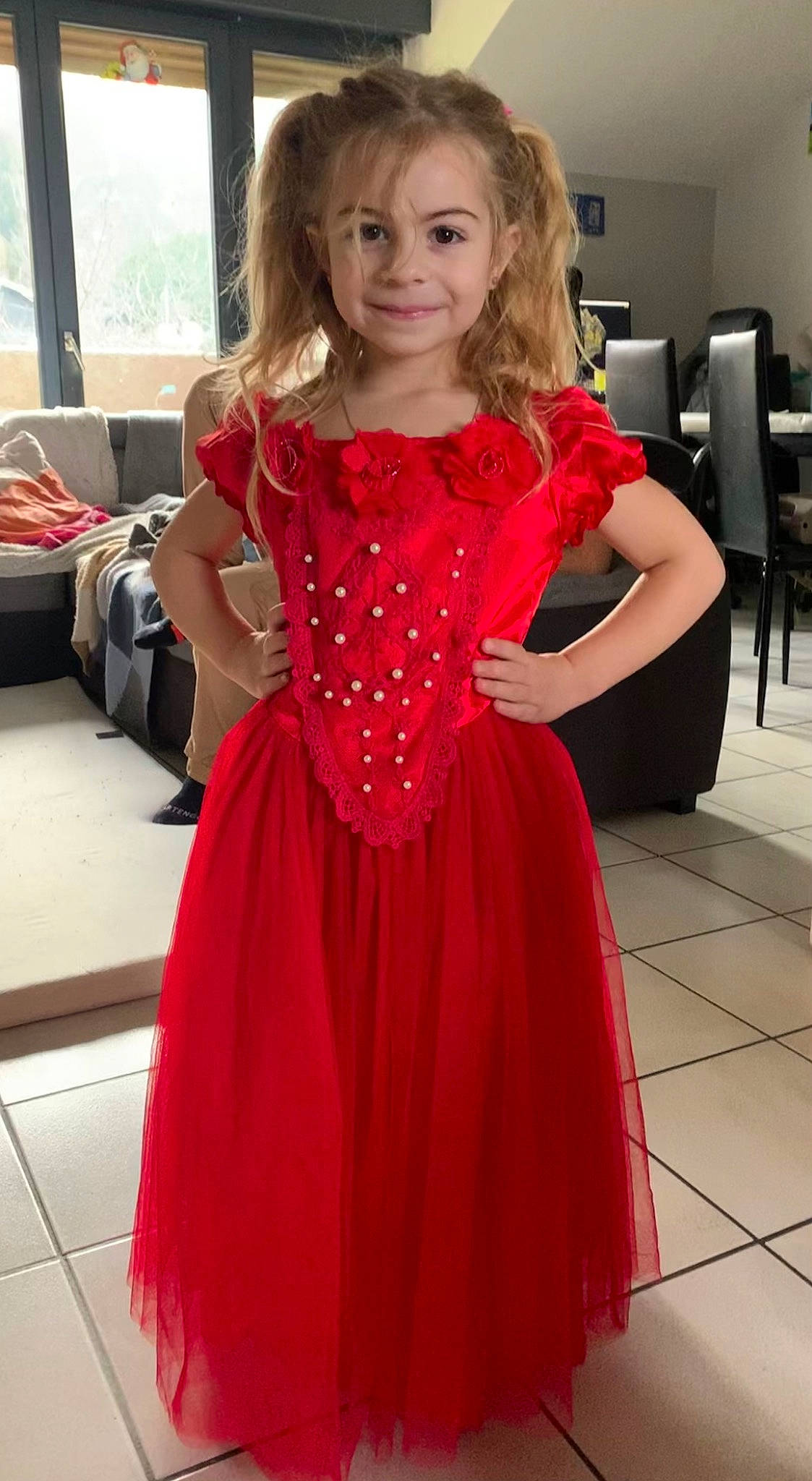 Celestine a rejoint le concours — aidez-le/la à gagner de superbes lots ! bridal_party_dress, day_dress, dress, embellishment, fashion, fashion_design, flooring, formal_wear, gown, head, joy, magenta, one_piece_garment, person, red, shoulder, skin, sleeve, smile, textile