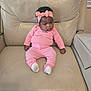 Kayla joined the competition — help win amazing prizes! baby, child, pink_clothing, headband, leather_chair, indoor, sitting, infant, cute, young_child, person, soft_lighting, relaxed, contemplative, furniture, homedecor, sock, one_person, portrait, casual