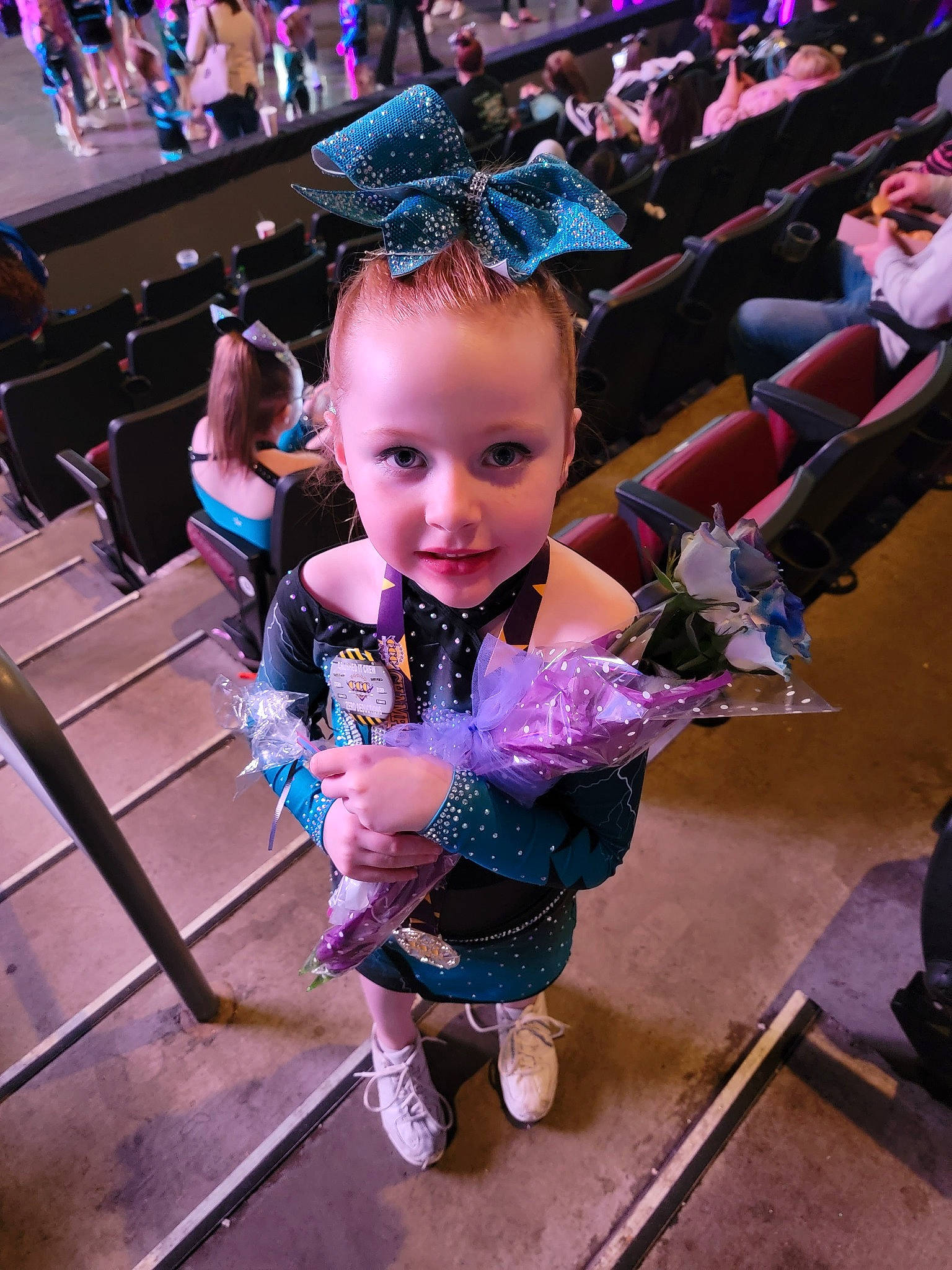 Teegan is registered to the contest to win money with this photo: child, costume, electric_blue, entertainment, event, flooring, fun, happy, leisure, magenta, makeover, performance, performing_arts, person, pink, purple, recreation, smile, toddler, tradition