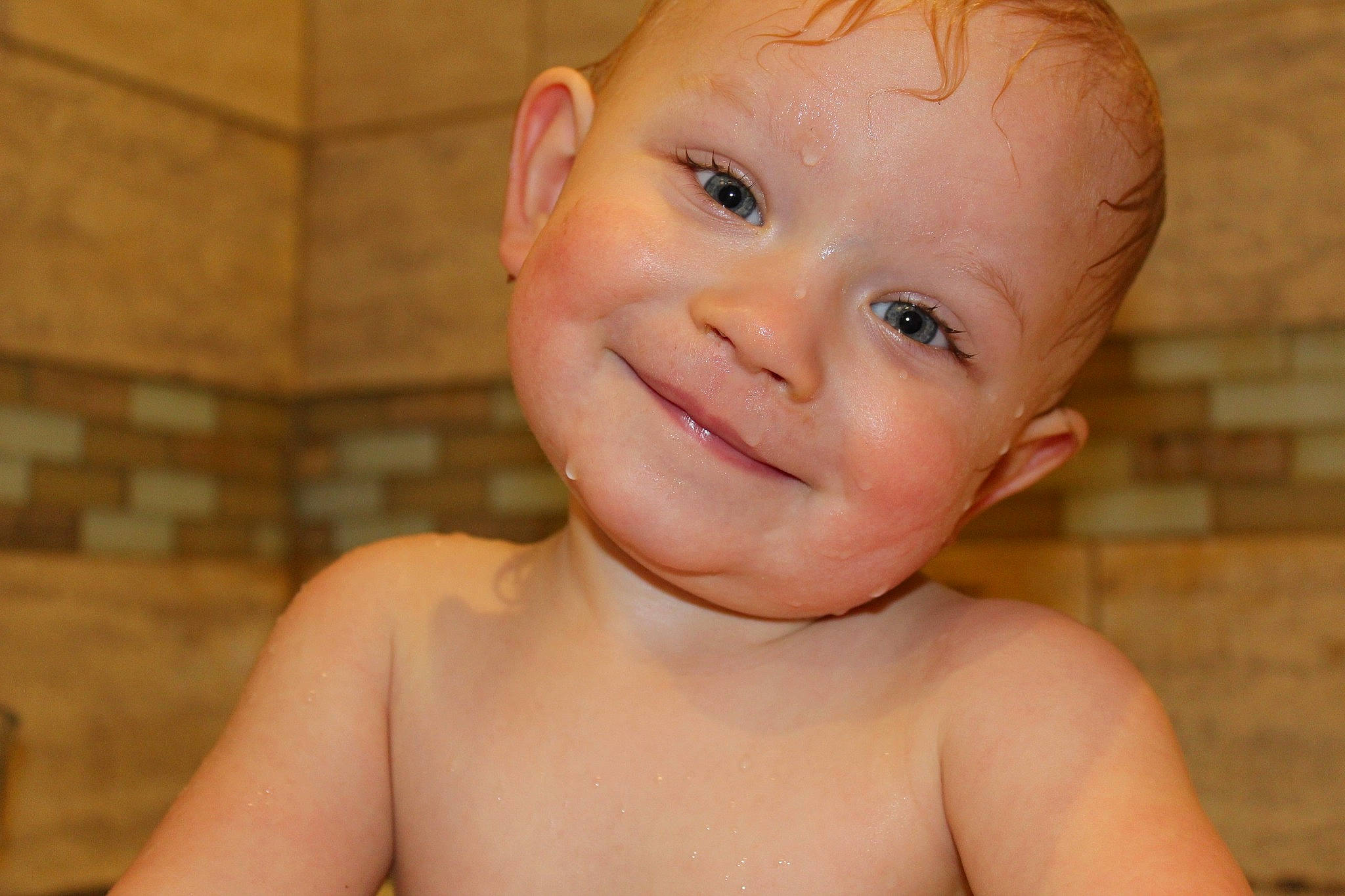 Bjorn is registered to the contest to win money with this photo: bathing, boy, cheek, child, chin, ear, face, forehead, head, infant, joy, lip, mouth, nose, person, skin, toddler