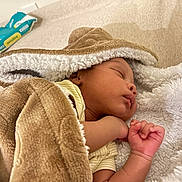 Jacarii joined the competition — help win amazing prizes! baby, sleeping, blanket, soft_texture, infant, cozy, resting, hand, face, peaceful, indoors, yellow_clothing, baby_wipes, fabric, close_up, skin, cute, newborn, toddler, comfort