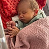 newborn, baby, sleeping, blanket, pink, red, cushion, pillow, floral, infant, bed, cozy, peaceful, cute, wrapped, hands, face, soft, resting, indoors