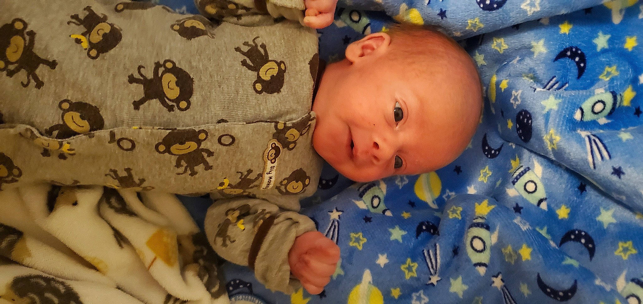 Dana is registered to the contest to win money with this photo: baby, baby_products, baby_toddler_clothing, baby_toys, bedtime, cheek, child, comfort, linens, pattern, person, room, skin, sleeve, smile, textile, toddler, wood